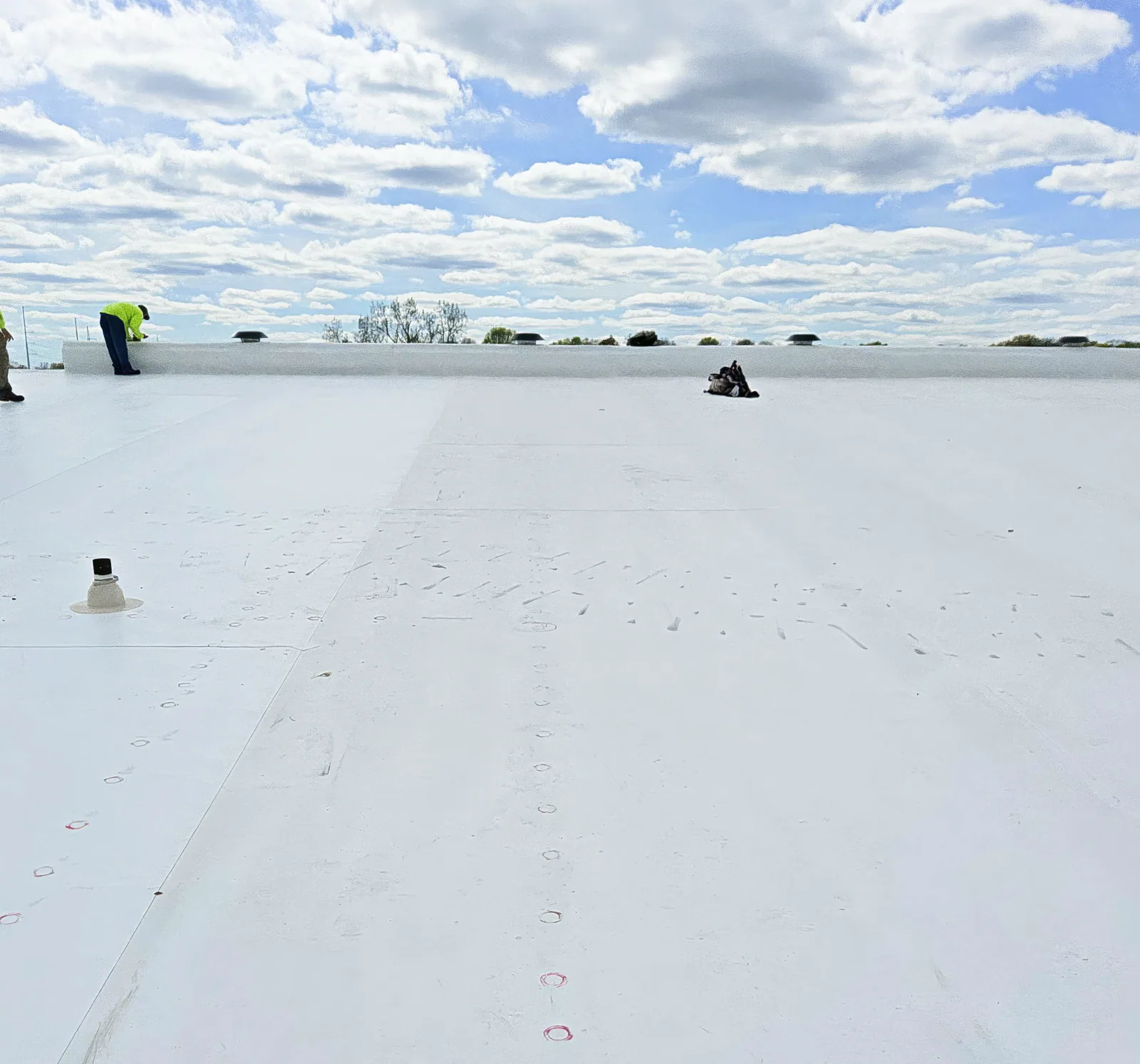 White TPO membrane on a commercial roof White TPO membrane on a commercial roof